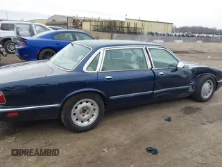 1998 Jaguar XJ Vanden Plas with VIN SAJKX6246WC832202, listed as a IAAI auction lot 41218807 with 96,589 mi miles and . Bid and sale history available at DreamBid. Image 4.