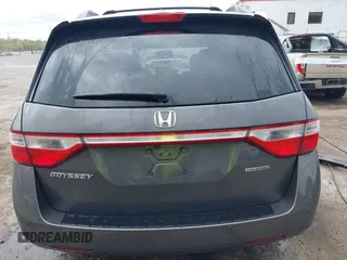 2013 Honda Odyssey Touring with VIN 5FNRL5H94DB013310, listed as a IAAI auction lot 42079565 with 128,622 mi miles and . Bid and sale history available at carsss.com. Image 16.