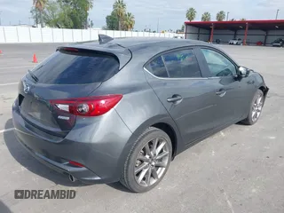 2018 Mazda 3 Touring with VIN 3MZBN1L32JM268582, listed as a IAAI auction lot 42072435 with 61,417 mi miles. Bid and sale history available at carsss.com. Image 4.