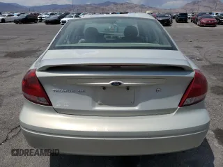 2007 Ford Taurus SE with VIN 1FAFP53U27A156844, listed as a Copart auction lot 59204695 with 157,633 mi miles and Salvage title. Bid and sale history available at DreamBid. Image 6.