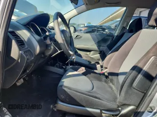 2007 Honda Fit with VIN JHMGD38407S066833, listed as a Copart auction lot 61713125 with 62,917 mi miles and Salvage title. Bid and sale history available at DreamBid. Image 7.