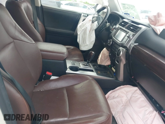 2014 Toyota 4Runner SR5 with VIN JTEZU5JR7E5080554, listed as a IAAI auction lot 42134833 with 170,077 mi miles and . Bid and sale history available at DreamBid. Image 5.