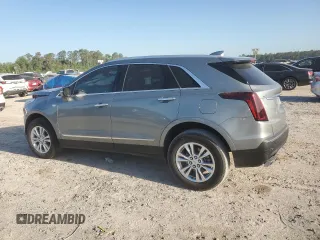 2023 Cadillac XT5 FWD Luxury z VIN 1GYKNAR49PZ174591, wystawiony jako Copart lot #52144985 z przebiegiem 20 005 mil mil oraz Szkoda całkowita • Salvage title. Historia ofert i sprzedaży dostępna na DreamBid. Obrazek 2.