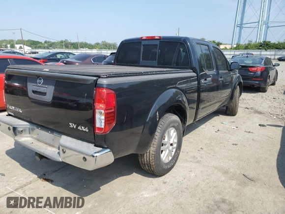 2014 Nissan Frontier SV with VIN 1N6AD0FV7EN736839, listed as a Copart auction lot 58390995 with 111,403 mi miles and Salvage title. Bid and sale history available at DreamBid. Image 3.