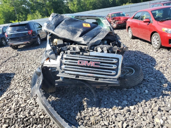 2015 GMC Canyon 2WD SLE z VIN 1GTH5BEA5F1190091, wystawiony jako Copart lot #59672204 z przebiegiem Nie podano mil oraz Szkoda całkowita • Salvage title. Historia ofert i sprzedaży dostępna na DreamBid. Obrazek 5.