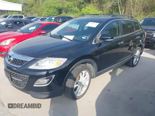 2012 Mazda CX-9 Grand Touring with VIN JM3TB2DA4C0343878, listed as a IAAI auction lot 41921590 with 168,927 mi miles and . Bid and sale history available at DreamBid. Image 2.
