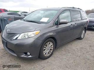 2012 Toyota Sienna XLE AAS with VIN 5TDYK3DC2CS276118, listed as a IAAI auction lot 41834422 with 143,043 mi miles. Bid and sale history available at carsss.com. Image 17.
