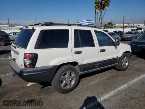 2004 Jeep Grand Cherokee with VIN 1J4GX48JX4C301369, listed as a Copart auction lot 77803094 with 179,404 mi miles and Clean title. Bid and sale history available at DreamBid. Image 3.