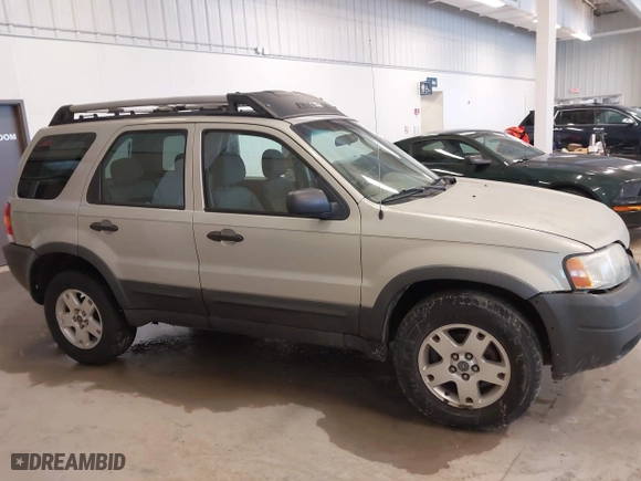 2004 Ford Escape XLT with VIN 1FMYU93164KB05521, listed as a IAAI auction lot 41723219 with 246,369 mi miles. Bid and sale history available at carsss.com. Image 13.