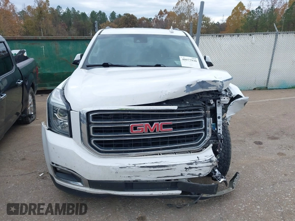 2019 GMC Yukon XL SLT with VIN 1GKS2GKC7KR165419, listed as a IAAI auction lot 40977930 with 167,195 mi miles and . Bid and sale history available at carsss.com. Image 12.