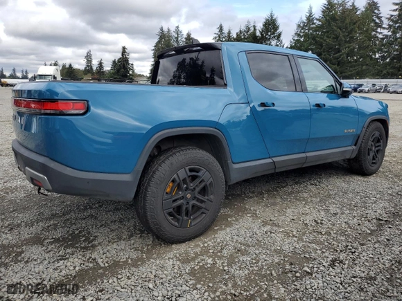 2022 Rivian R1T Launch Edition with VIN 7FCTGAAL0NN001418, listed as a Copart auction lot 75002264 with 28,835 mi miles and Salvage Title. Bid and sale history available at carsss.com. Image 3.