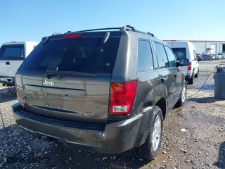 2006 Jeep Grand Cherokee Laredo with VIN 1J4GR48K56C326847, listed as a IAAI auction lot 41972623 with 141,088 mi miles. Bid and sale history available at carsss.com. Image 4.