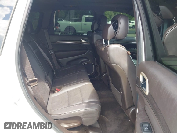 2014 Jeep Grand Cherokee Summit with VIN 1C4RJFJT6EC281114, listed as a IAAI auction lot 42497582 with 128,181 mi miles and . Bid and sale history available at DreamBid. Image 8.