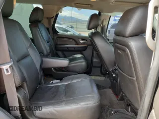 2014 Cadillac Escalade Premium z VIN 1GYS4CEF5ER221795, wystawiony jako Copart lot #55036035 z przebiegiem 136 606 mil mil oraz Szkoda całkowita • Salvage title. Historia ofert i sprzedaży dostępna na DreamBid. Obrazek 11.