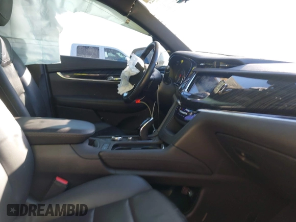 2022 Cadillac XT6 Premium Luxury with VIN 1GYKPCRS1NZ121711, listed as a IAAI auction lot 41149624 with 62,887 mi miles and . Bid and sale history available at DreamBid. Image 5.