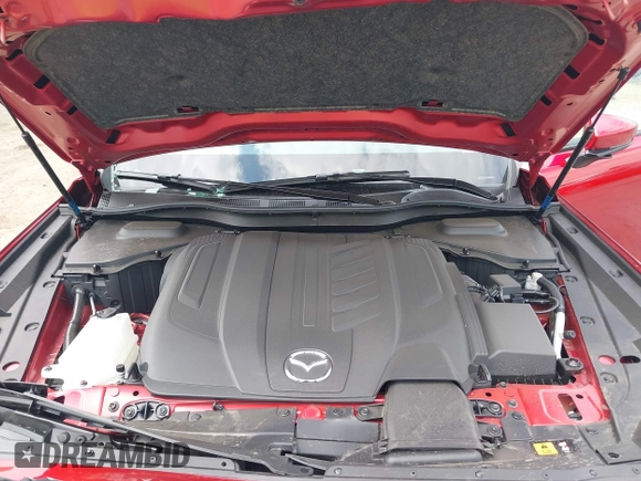2025 Mazda CX-90 Preferred z VIN JM3KKBHD9S1208744, wystawiony jako IAAI lot #42019049 z przebiegiem 4 663 mil mil oraz . Historia ofert i sprzedaży dostępna na DreamBid. Obrazek 10.
