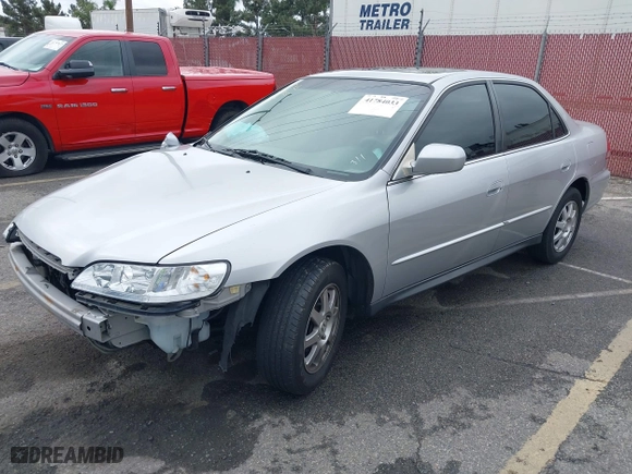 2002 Honda Accord Sdn SE with VIN JHMCG66802C013856, listed as a IAAI auction lot 41784033 with 143,994 mi miles. Bid and sale history available at carsss.com. Image 18.