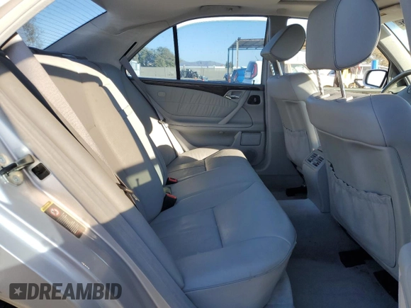 2002 Mercedes-Benz E-Class with VIN WDBJF65J82B478924, listed as a Copart auction lot 87767635 with 154,377 mi miles and Salvage Title. Bid and sale history available at carsss.com. Image 10.