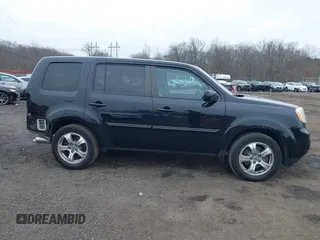 2013 Honda Pilot EX-L with VIN 5FNYF4H71DB021487, listed as a IAAI auction lot 41272308 with 188,217 mi miles and . Bid and sale history available at DreamBid. Image 13.