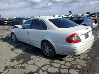 2007 Mercedes-Benz E-Class 3.5L with VIN WDBUF56X47B084760, listed as a Copart auction lot 84942024 with 117,213 mi miles and Salvage Title. Bid and sale history available at carsss.com. Image 2.