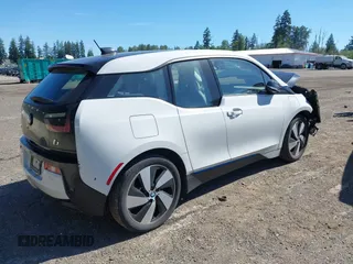 2017 BMW i3 with VIN WBY1Z8C37HV890461, listed as a IAAI auction lot 42396115 with 66,359 mi miles and . Bid and sale history available at DreamBid. Image 4.
