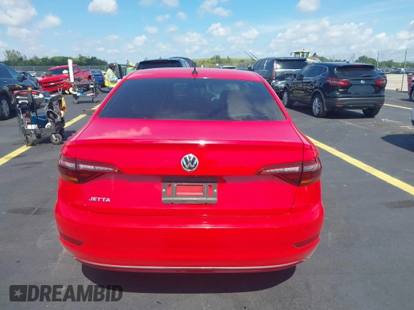 2019 Volkswagen Jetta S z VIN 3VWC57BUXKM029610, wystawiony jako IAAI lot #42334649 z przebiegiem 34 072 mil mil oraz . Historia ofert i sprzedaży dostępna na DreamBid. Obrazek 16.