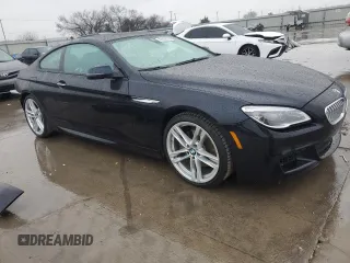 2017 BMW 6 Series z VIN WBA6H5C3XHG238010, wystawiony jako Copart lot #87314274 z przebiegiem 69 607 mil mil oraz Szkoda całkowita • Salvage title. Historia ofert i sprzedaży dostępna na DreamBid. Obrazek 4.