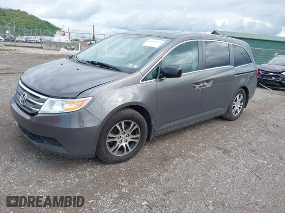 2012 Honda Odyssey EX-L with VIN 5FNRL5H68CB060487, listed as a IAAI auction lot 42176223 with 234,078 mi miles and . Bid and sale history available at DreamBid. Image 18.