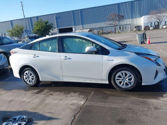2018 Toyota Prius Two with VIN JTDKBRFU2J3060301, listed as a IAAI auction lot 41330691 with 130,819 mi miles. Bid and sale history available at carsss.com. Image 14.