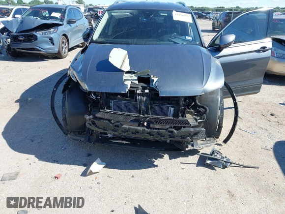 2024 Volkswagen Tiguan SE with VIN 3VV3B7AX9RM001526, listed as a IAAI auction lot 42216575 with 8,548 mi miles and . Bid and sale history available at DreamBid. Image 6.