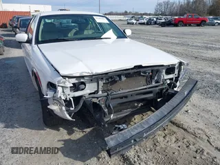 2005 Mercury Grand Marquis LS Premium z VIN 2MEFM75W05X621461, wystawiony jako IAAI lot #41381365 z przebiegiem 139 971 mil mil oraz . Historia ofert i sprzedaży dostępna na DreamBid. Obrazek 6.