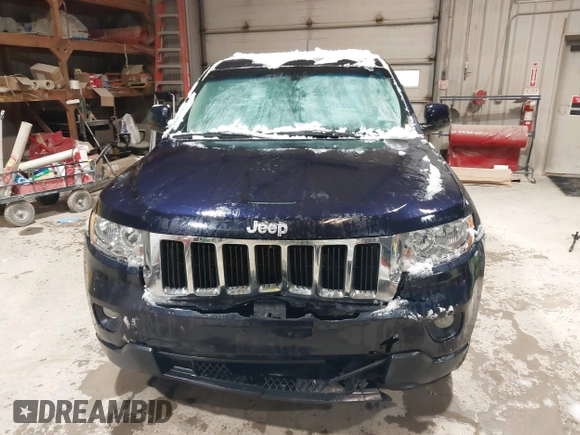 2011 Jeep Grand Cherokee Laredo with VIN 1J4RR4GG3BC640075, listed as a IAAI auction lot 41712754 with 190,199 mi miles. Bid and sale history available at carsss.com. Image 12.