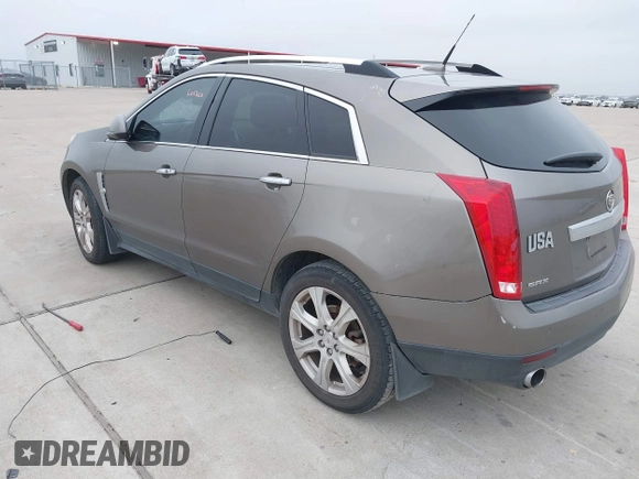 2011 Cadillac SRX Premium Collection with VIN 3GYFNCEY5BS648399, listed as a IAAI auction lot 41442819 with 184,981 mi miles. Bid and sale history available at carsss.com. Image 3.