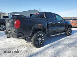 2024 GMC Canyon 4WD Denali with VIN 1GTP6FEK2R1119475, listed as a Copart auction lot 42523575 with 22,683 mi miles and Salvage Title. Bid and sale history available at carsss.com. Image 3.