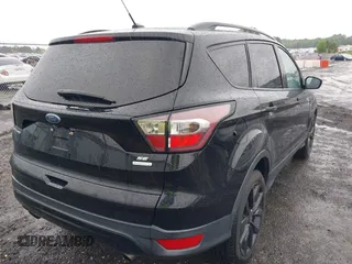 2017 Ford Escape SE with VIN 1FMCU0GD3HUD07141, listed as a IAAI auction lot 42250771 with 116,086 mi miles and . Bid and sale history available at DreamBid. Image 21.