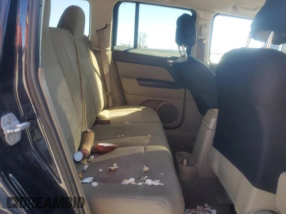 2011 Jeep Patriot Sport with VIN 1J4NT1GA0BD118623, listed as a Copart auction lot 50053445 with 129,843 mi miles and Salvage Title. Bid and sale history available at carsss.com. Image 11.