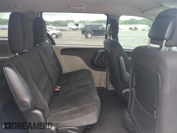 2017 Dodge Grand Caravan SE z VIN 2C4RDGBG6HR793773, wystawiony jako Copart lot #58641525 z przebiegiem 65 453 mil mil oraz Szkoda całkowita • Salvage title. Historia ofert i sprzedaży dostępna na DreamBid. Obrazek 11.