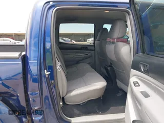 2014 Toyota Tacoma with VIN 3TMLU4EN6EM148851, listed as a IAAI auction lot 42307954 with 71,784 mi miles and . Bid and sale history available at DreamBid. Image 8.