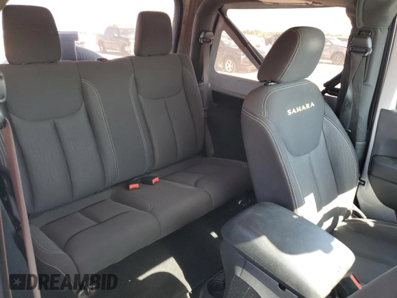 2015 Jeep Wrangler Sahara z VIN 1C4AJWBG8FL513650, wystawiony jako Copart lot #54578075 z przebiegiem 38 043 mil mil oraz Nie do naprawy • Non repairable. Historia ofert i sprzedaży dostępna na DreamBid. Obrazek 10.