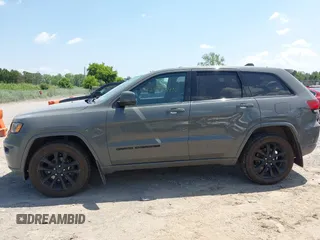 2020 Jeep Grand Cherokee Laredo E with VIN 1C4RJFAG0LC293050, listed as a IAAI auction lot 42566345 with 64,960 mi miles and . Bid and sale history available at DreamBid. Image 14.