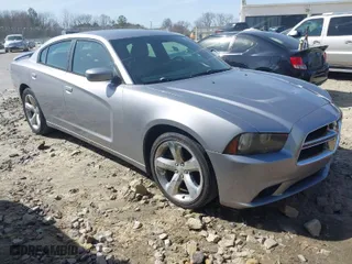 2014 Dodge Charger SXT with VIN 2C3CDXHG3EH277955, listed as a IAAI auction lot 41758757 with 164,614 mi miles. Bid and sale history available at carsss.com. Image 1.