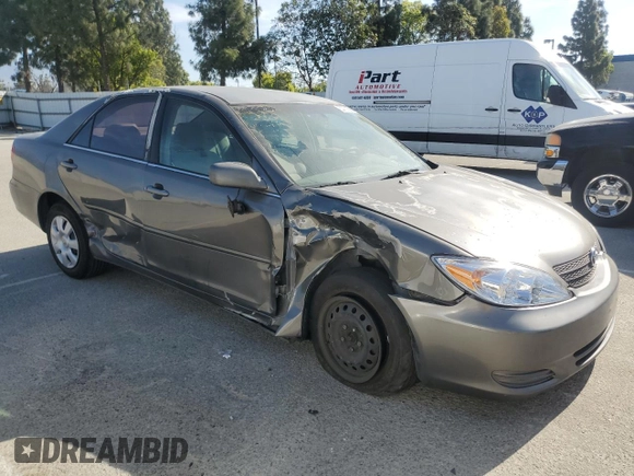 2004 Toyota Camry LE z VIN 4T1BE32K34U881717, wystawiony jako Copart lot #53731565 z przebiegiem Nie podano mil oraz Szkoda całkowita • Salvage title. Historia ofert i sprzedaży dostępna na DreamBid. Obrazek 4.