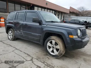 2014 Jeep Patriot Sport with VIN 1C4NJRBB6ED520841, listed as a Copart auction lot 48103545 with 136,012 mi miles and Salvage Title. Bid and sale history available at DreamBid. Image 4.