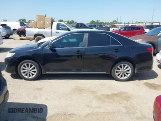 2014 Toyota Camry L with VIN 4T4BF1FK3ER413537, listed as a IAAI auction lot 42015577 with 181,592 mi miles. Bid and sale history available at carsss.com. Image 14.