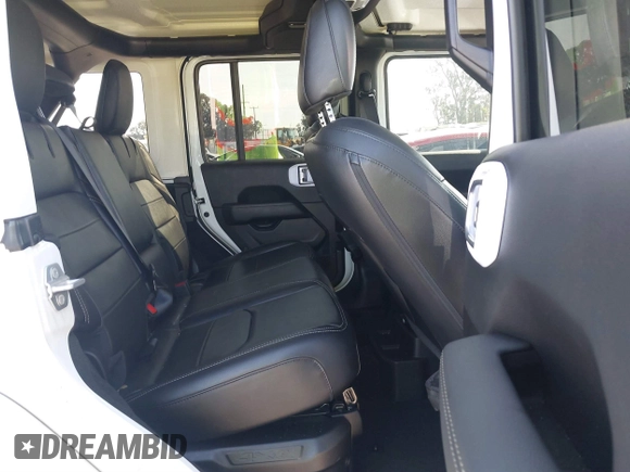 2021 Jeep Wrangler Unlimited Sahara z VIN 1C4JJXP6XMW765398, wystawiony jako IAAI lot #41592185 z przebiegiem 26 834 mil mil oraz . Historia ofert i sprzedaży dostępna na DreamBid. Obrazek 8.