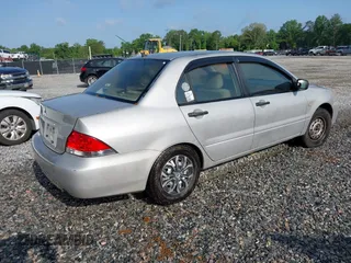 2005 Mitsubishi Lancer ES z VIN JA3AJ26E35U028910, wystawiony jako IAAI lot #42329182 z przebiegiem 159 803 mil mil oraz . Historia ofert i sprzedaży dostępna na DreamBid. Obrazek 4.