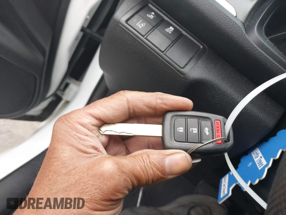 2020 Honda Civic LX with VIN 2HGFC2F64LH593100, listed as a IAAI auction lot 41877572 with 76,713 mi miles and . Bid and sale history available at DreamBid. Image 11.