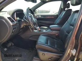 2017 Jeep Grand Cherokee Overland with VIN 1C4RJFCGXHC941983, listed as a Copart auction lot 52008825 with 65,776 mi miles and Salvage Title. Bid and sale history available at carsss.com. Image 7.