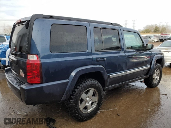 2010 Jeep Commander Sport with VIN 1J4RG4GK5AC119433, listed as a Copart auction lot 87657265 with 212,973 mi miles and Salvage title. Bid and sale history available at DreamBid. Image 3.