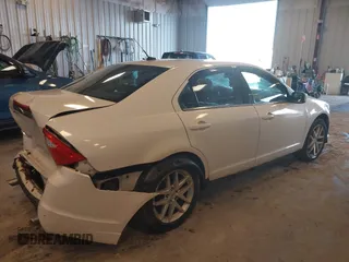2012 Ford Fusion SEL with VIN 3FAHP0JGXCR128976, listed as a IAAI auction lot 41721468 with 115,277 mi miles. Bid and sale history available at carsss.com. Image 4.